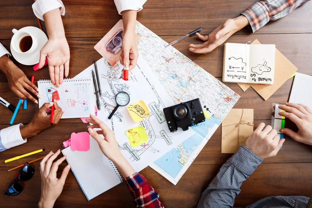 businessmen-hands-wooden-table-with-documents-drafts